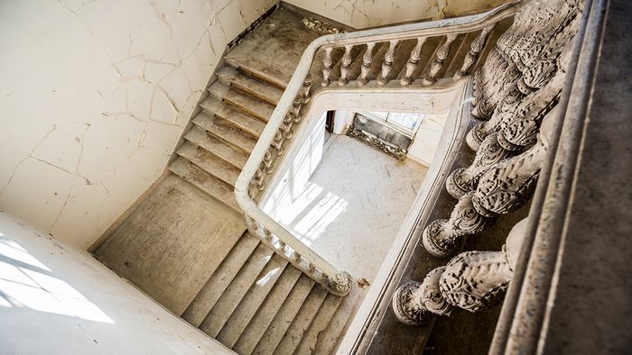 Original ornate staircase from 2nd level down