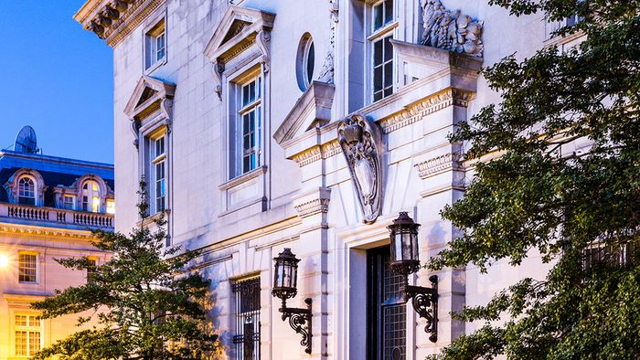 Exterior of Leasing Office with opulent entrance during twilight