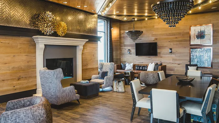 Room with Wood from Floor to Ceiling and Fireplace