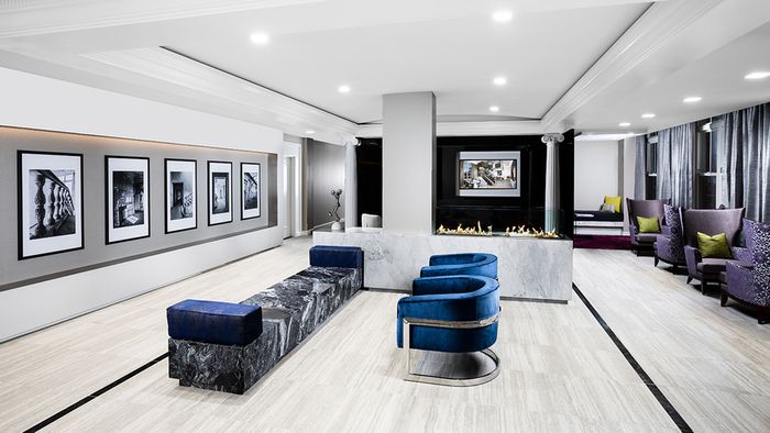Curated resident lounge complete with fireplaces and stunning millwork