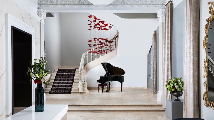 Main foyer with Grand Piano and elegant staircase