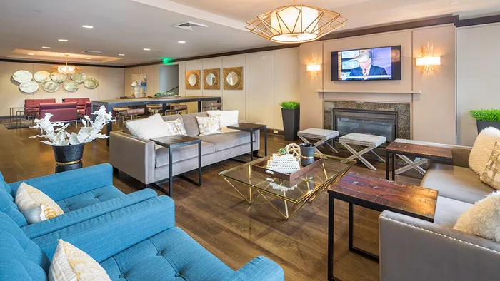 Resident lounge with access to TV and flexible work space