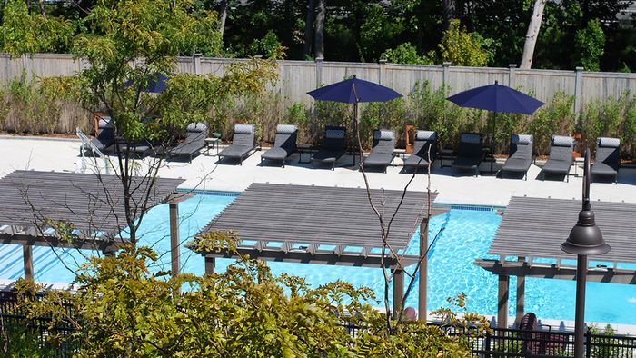 Cabanas and Pool area at Modera Needham Apartments