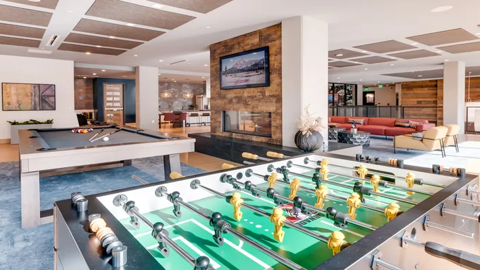 Gameroom at Modera Jack London Square featuring a Foosball and billiards table