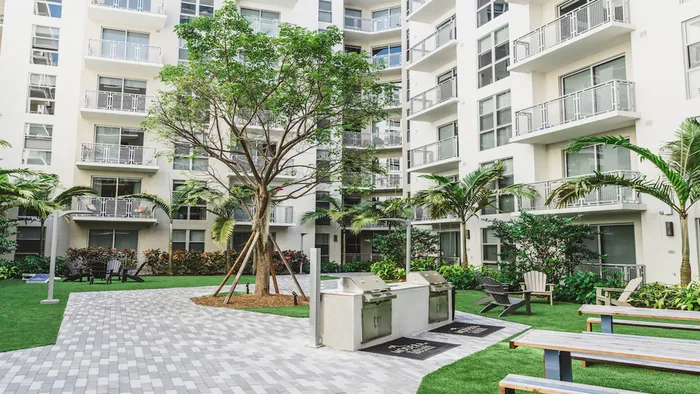 Courtyard with grilling stations and dining areas