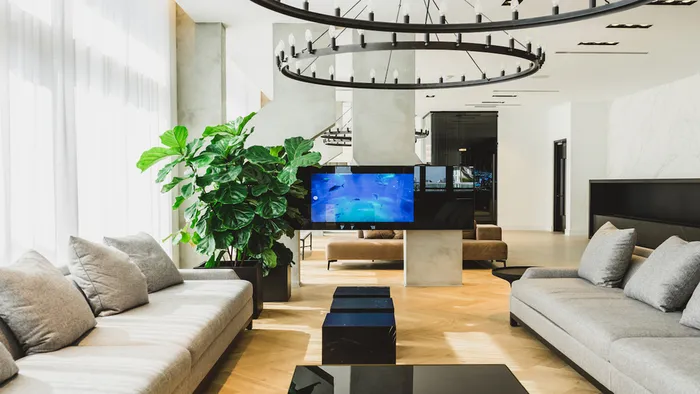 Lounge Area featuring Ample Seating and Large, Circular Lighting