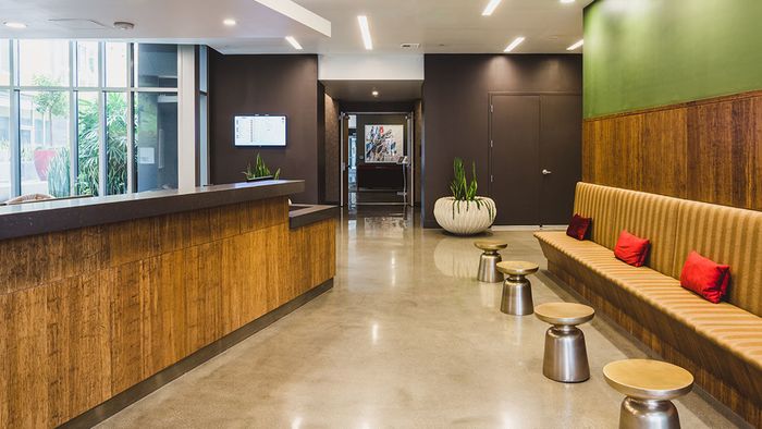 Resident lounge with bench seating and small tables