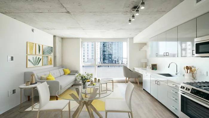 Light-filled homes with stunning downtown views, gas cooking and built-in workspaces at Modera Rincon Hill apartments.