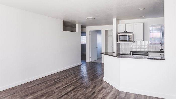 From living area, open breakfast bar to a reimagined kitchen
