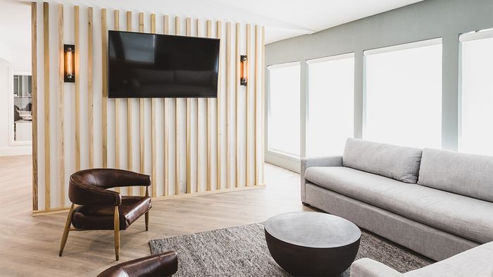 Reimagined clubroom with seating and TV