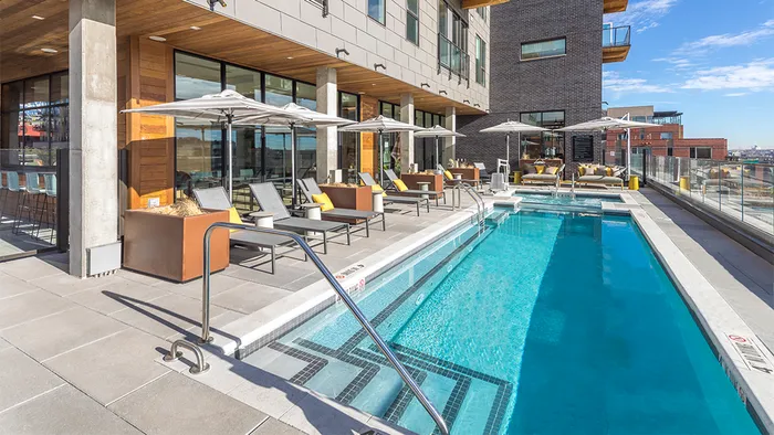Swimming pool with sundeck, chaise lounges, gorgeous views