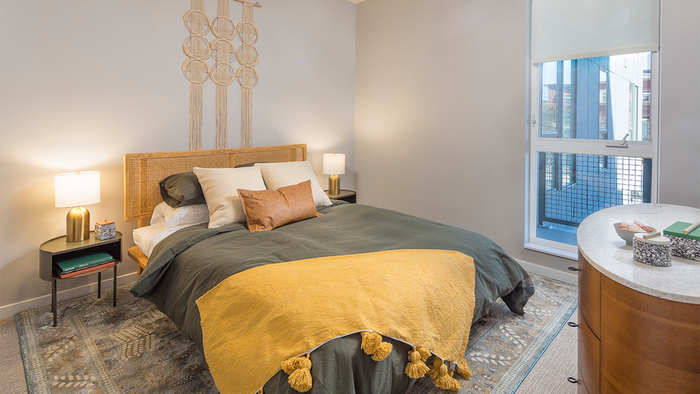 Spacious bedrooms with custom roller shades