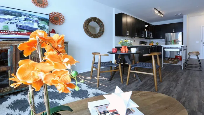 Open Kitchen with Wood Plank-Style Flooring