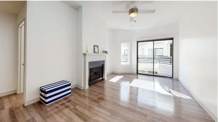 Open living room with wood-plank style flooring