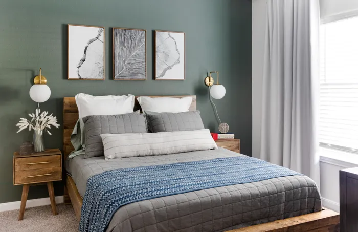 large bedroom with natural light and luxe finishes at alister oak hill apartments austin texas