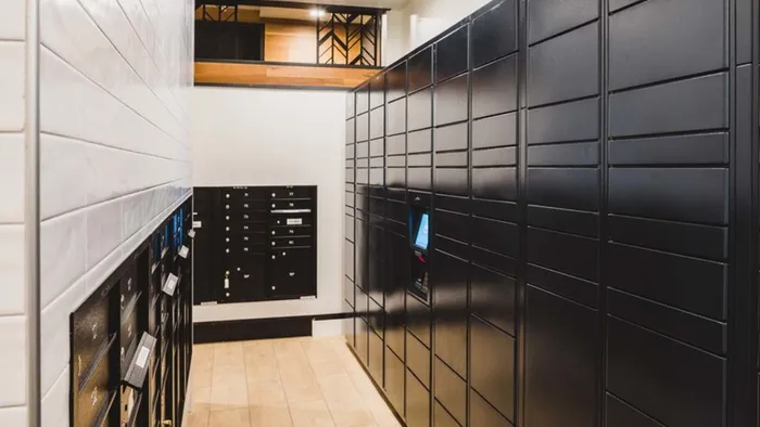 Package locker system at Modera Broadway apartments.