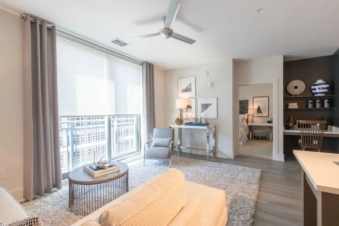 natural light in living room area looking onto bedroom at Modera Midtown apartment homes in atlanta georgia