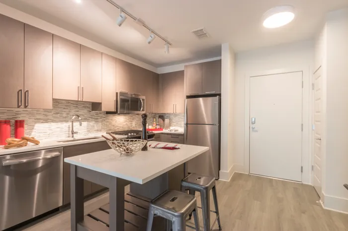 luxe kitchen with designer finishes at Modera Midtown apartment homes in atlanta georgia