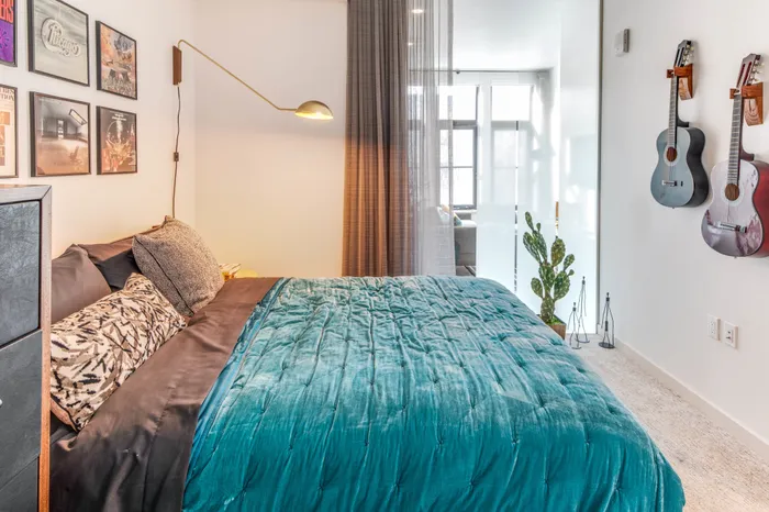 spacious bedroom with plenty of natural light at modera jack london square apartment homes for rent in oakland california