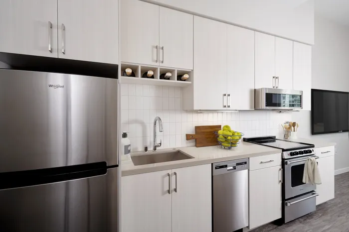 premium stainless steel appliances in kitchen at modera jack london square apartment homes for rent in oakland california