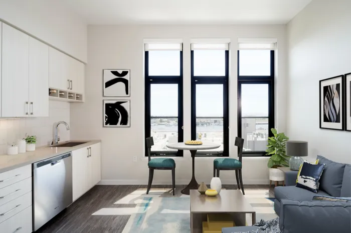 open concept living room and kitchen space at modera jack london square apartment homes for rent in oakland california