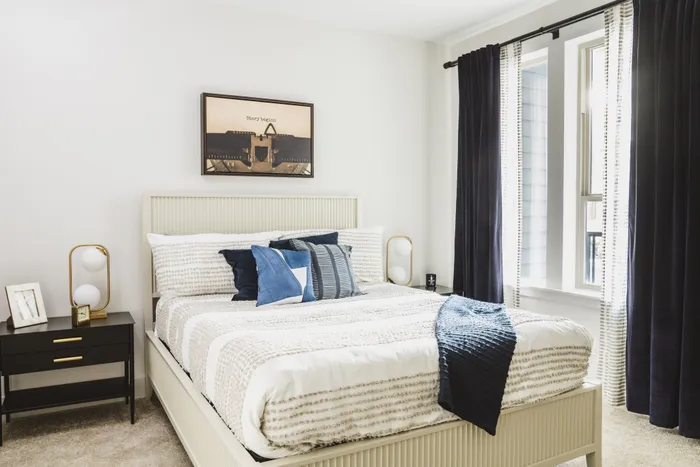 bedroom with large window at modera decatur apartment homes for rent in georgia