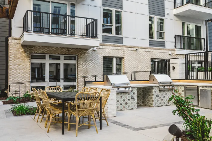 outdoor dining and grilling station at modera decatur apartment homes for rent in georgia