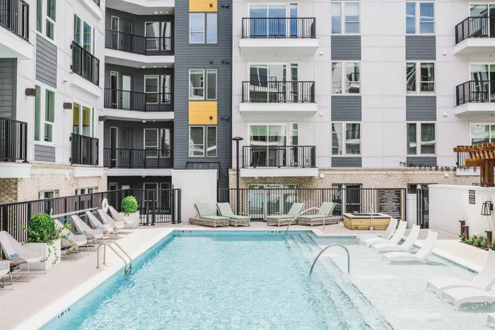 large swimming pool and sundeck at modera decatur apartment homes for rent in georgia