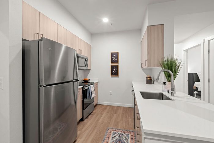 Brand new kitchen with stainless steel appliances
