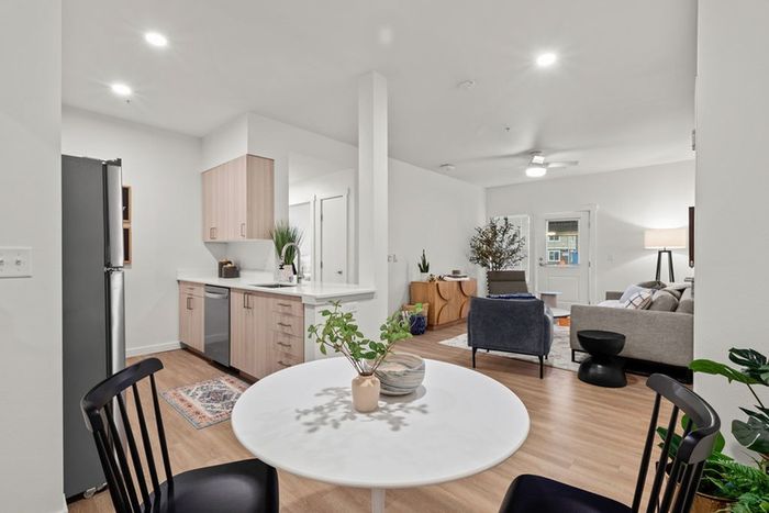 Dining room area overlooking spacious living room