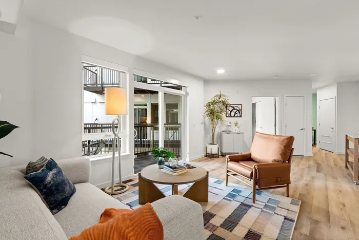 Living area with hardwood plank-style flooring