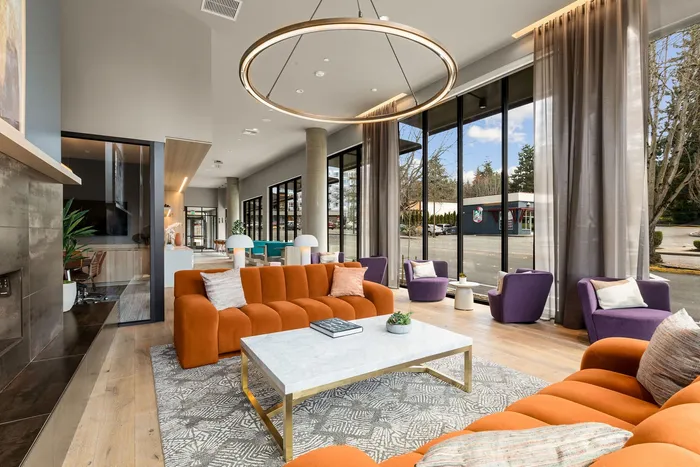 Modern clubroom with luxury fixtures, plenty of seating, and more