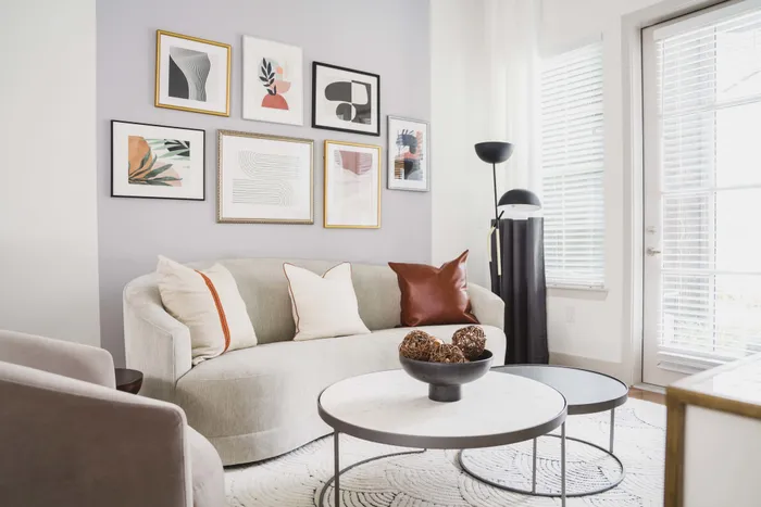 Spacious living rooms boasting in tons of natural light in a Modera Frisco Square apartment