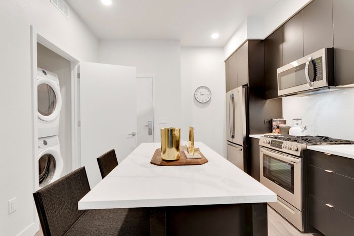 large kitchen island with space for entertaining and cooking modera art park apartment homes for rent in denver colorado