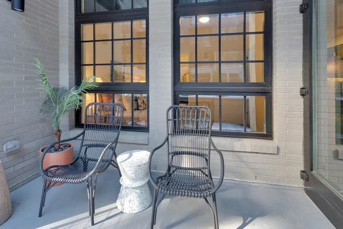 spacious patio/balcony with seating modera art park apartment homes for rent in denver colorado