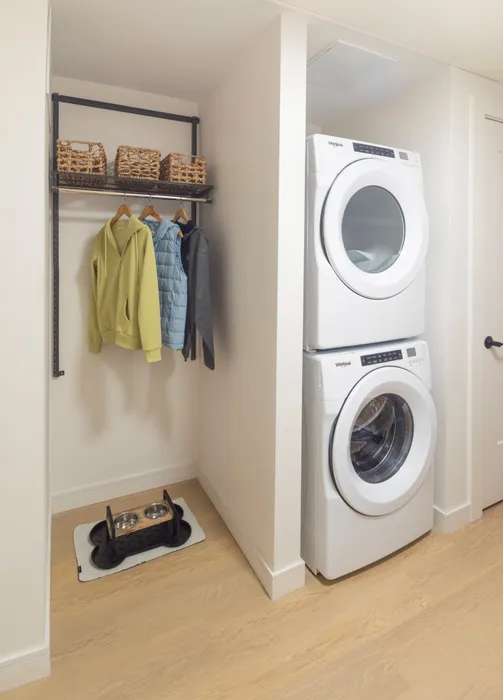 washer and dryer stacked next to coat closet modera cherry creek apartment homes for rent in denver colorado