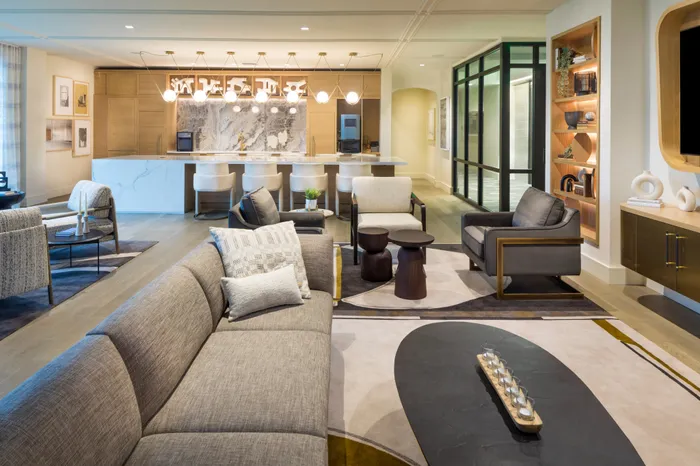 seating area looking into coffee bar and demonstration kitchen modera cherry creek apartment homes for rent in denver colorado