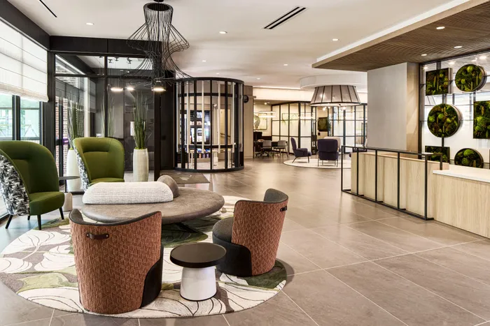 seating and social space in clubhouse at modera clarendon apartment homes for rent in arlington va