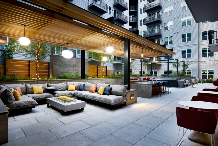 covered outdoor seating in courtyard at modera clarendon apartment homes for rent in arlington va