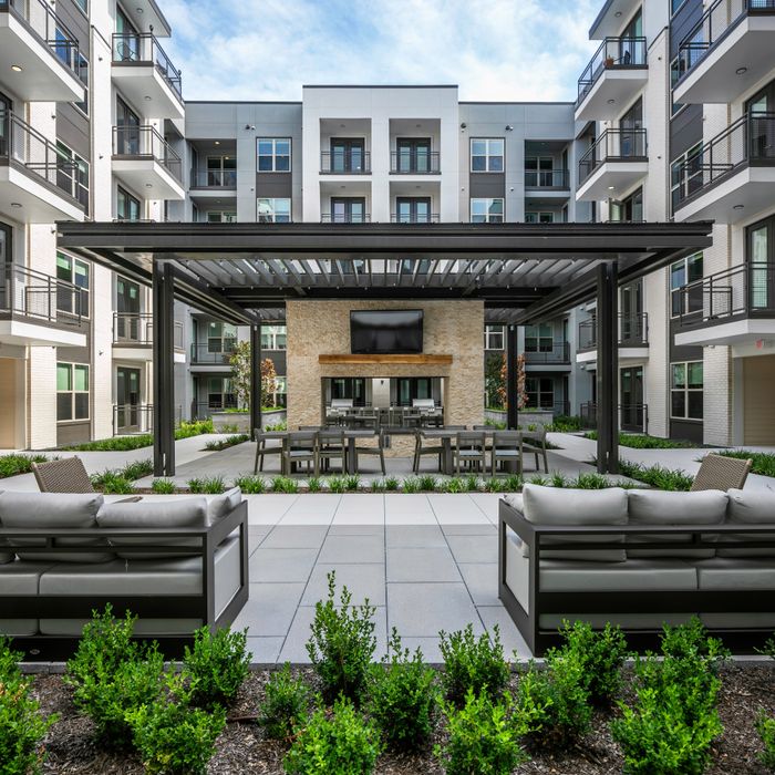 grilling stations with tv outside at modera six pines apartment homes for rent in shenandoah texas