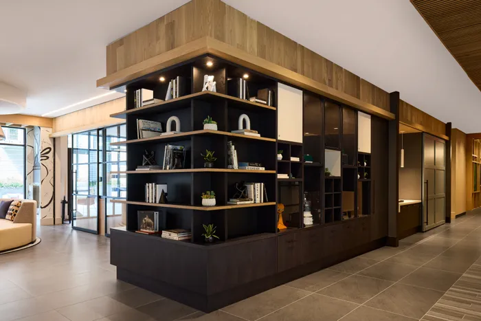 resident library with free lending and reading spaces in club room