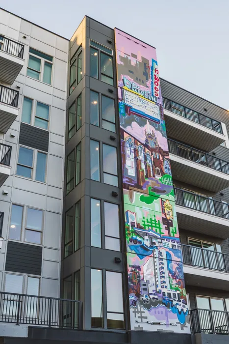 Modera Decatur art display on side of building