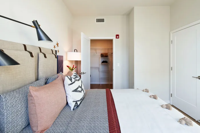 bedroom looking into closet with door Modera Berkeley, CA apartment.