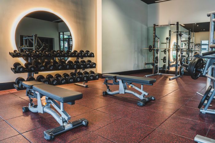 luxury on-site fitness center with free weights