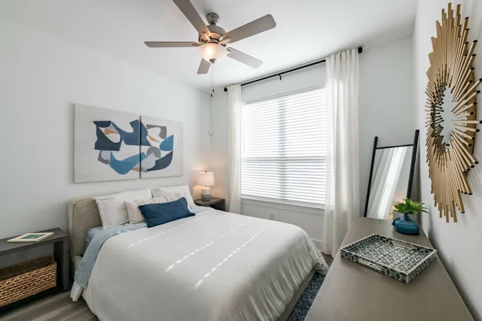 bedroom with large windows and natural light at amavi celina single family homes for rent in texas
