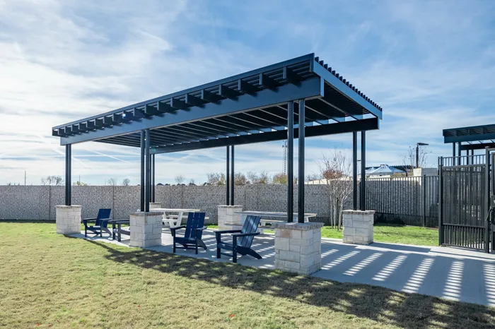 covered outdoor dining area at amavi celina single family homes for rent in texas
