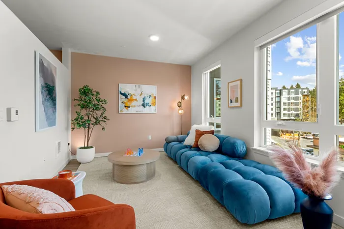 living room with furniture and large windows at modera overlake apartment homes for rent in WA