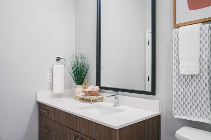 single vanity bathroom with quartz countertops