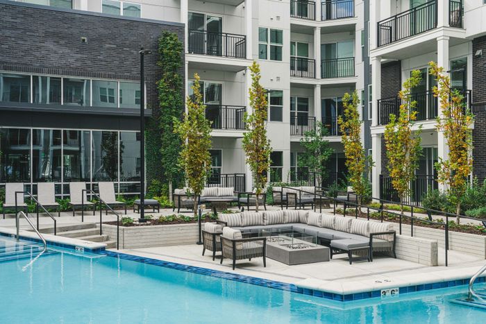 spacious pool with plenty of pool deck seating