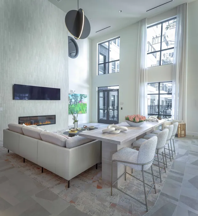 tv lounge with comfortable seating and large TV